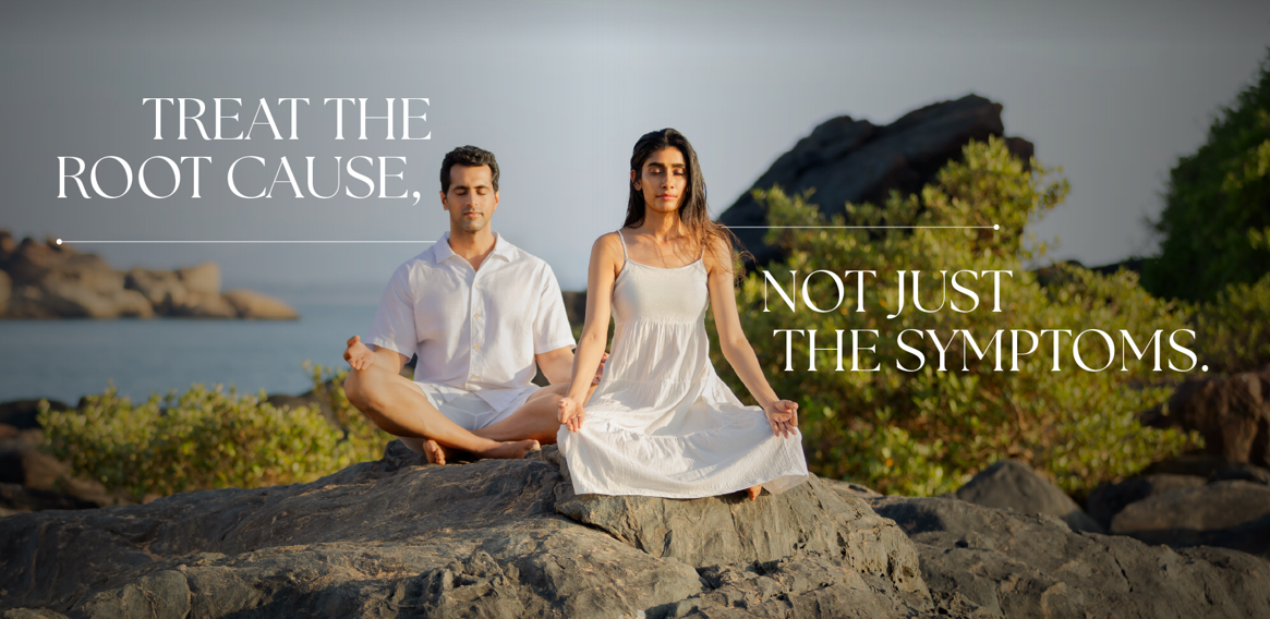 Two people meditating by the coast with the message: Treat the root cause, not just the symptoms